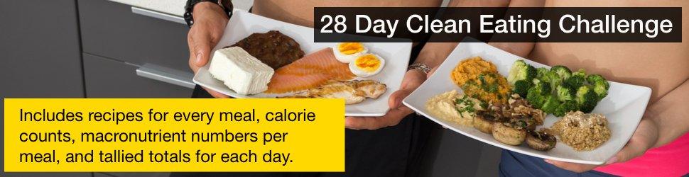 Two people holding plates of healthy meals with vegetables, eggs, and fish for a 28 Day Clean Eating Challenge.