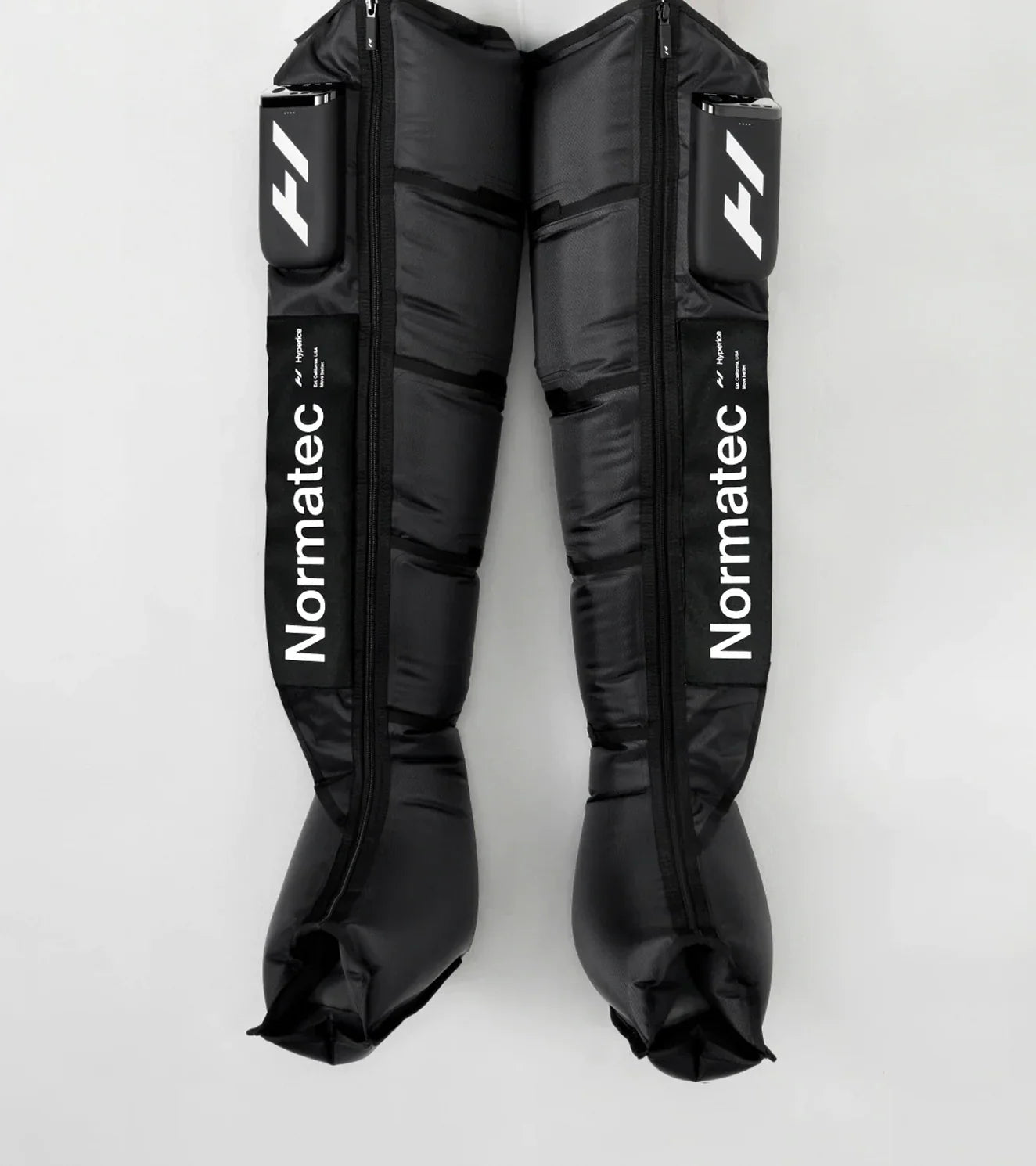 Normatec compression leg sleeves for athletic muscle recovery therapy