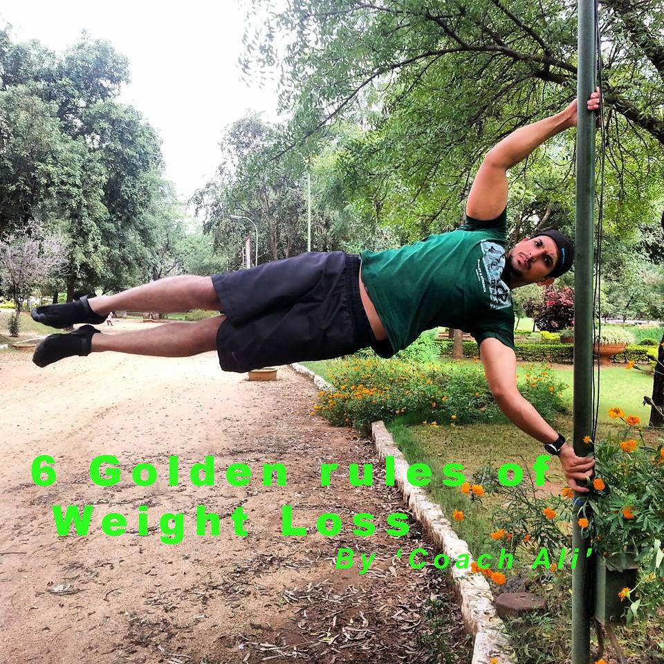 Athlete performing human flag exercise outdoors, promoting weight loss rules and fitness tips