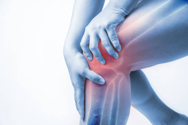 Person holding knee in pain with highlighted knee joint, knee pain and injury concept
