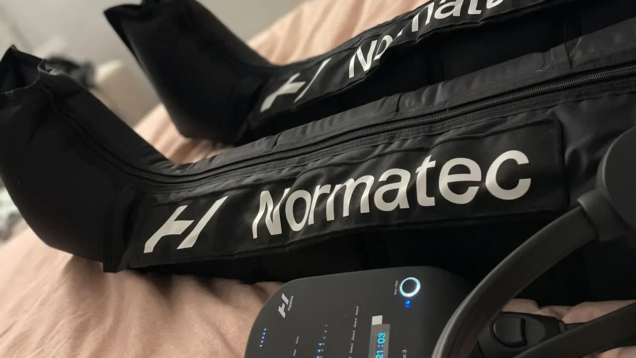 Normatec leg recovery compression sleeves with digital control unit for athletes