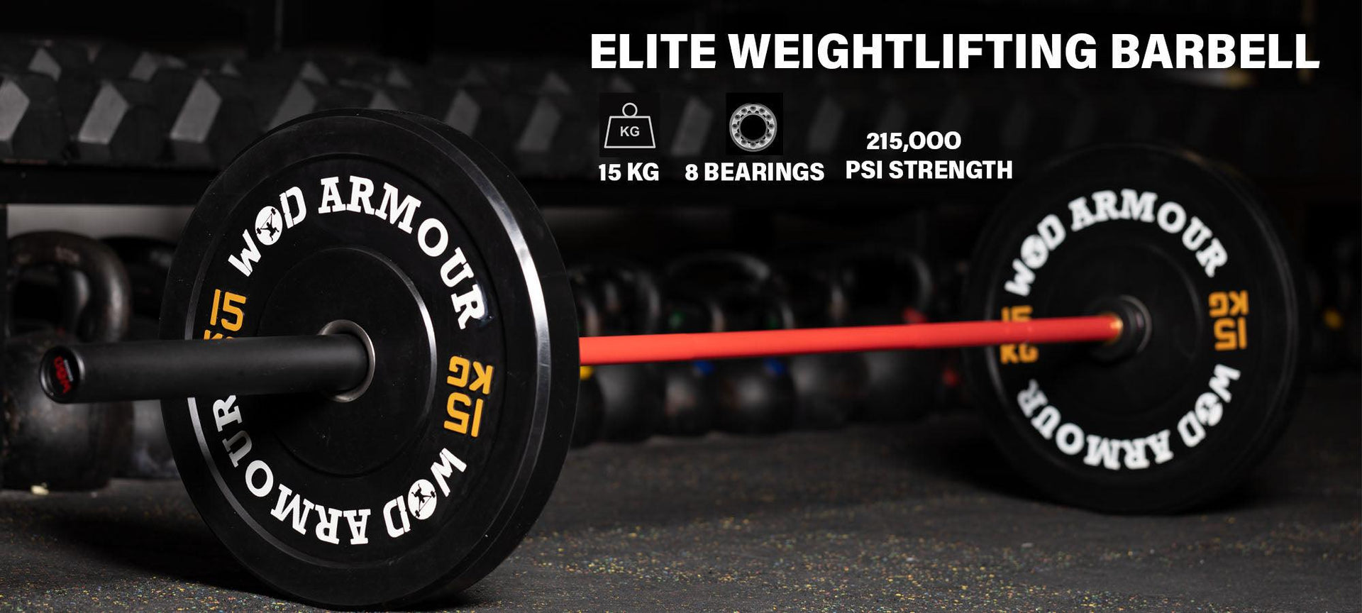 15kg elite weightlifting barbell with black plates and red shaft on gym floor