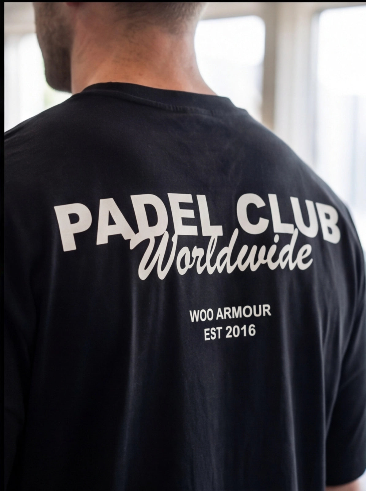 Black Padel Club Worldwide t-shirt by WOO ARMOUR, functional fitness apparel for athletes