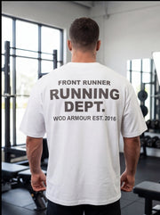 Man wearing white 'Front Runner Running Dept.' gym t-shirt, WOD Armour fitness apparel, back view in gym