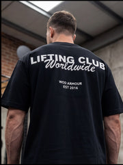 Man wearing black 'Lifting Club Worldwide' gym t-shirt, WOD Armour fitness apparel for athletes