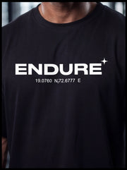 Black ENDURE fitness t-shirt with coordinates, designed for athletic performance and injury prevention.