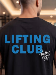 Man wearing black Lifting Club gym shirt with '1% Better Every Day' slogan, ideal for functional fitness training.