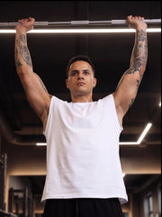 Athlete gripping pull-up bar in gym, showcasing strength training and functional fitness gear.