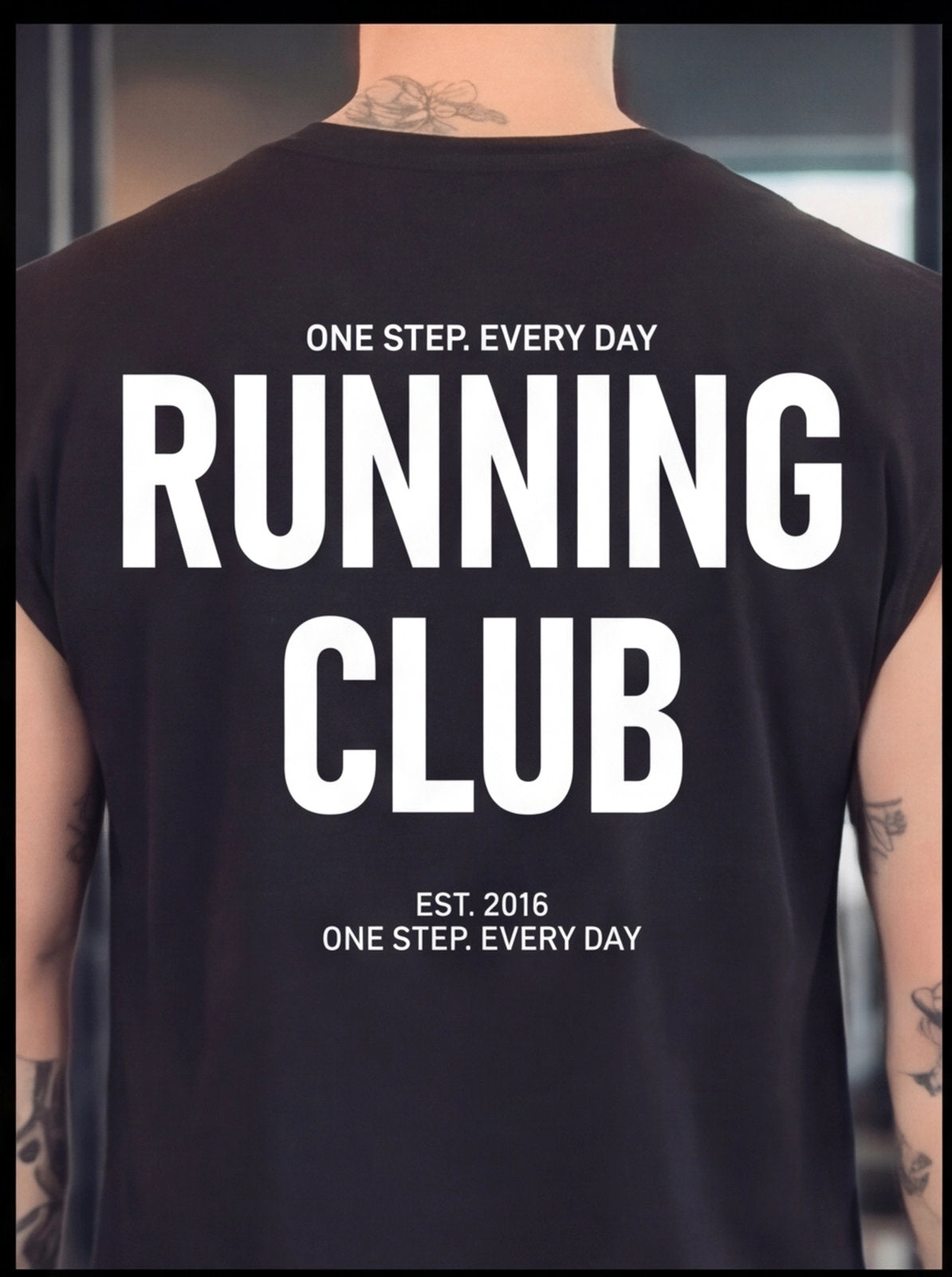 Black Running Club t-shirt with bold white text, worn by tattooed person, fitness apparel
