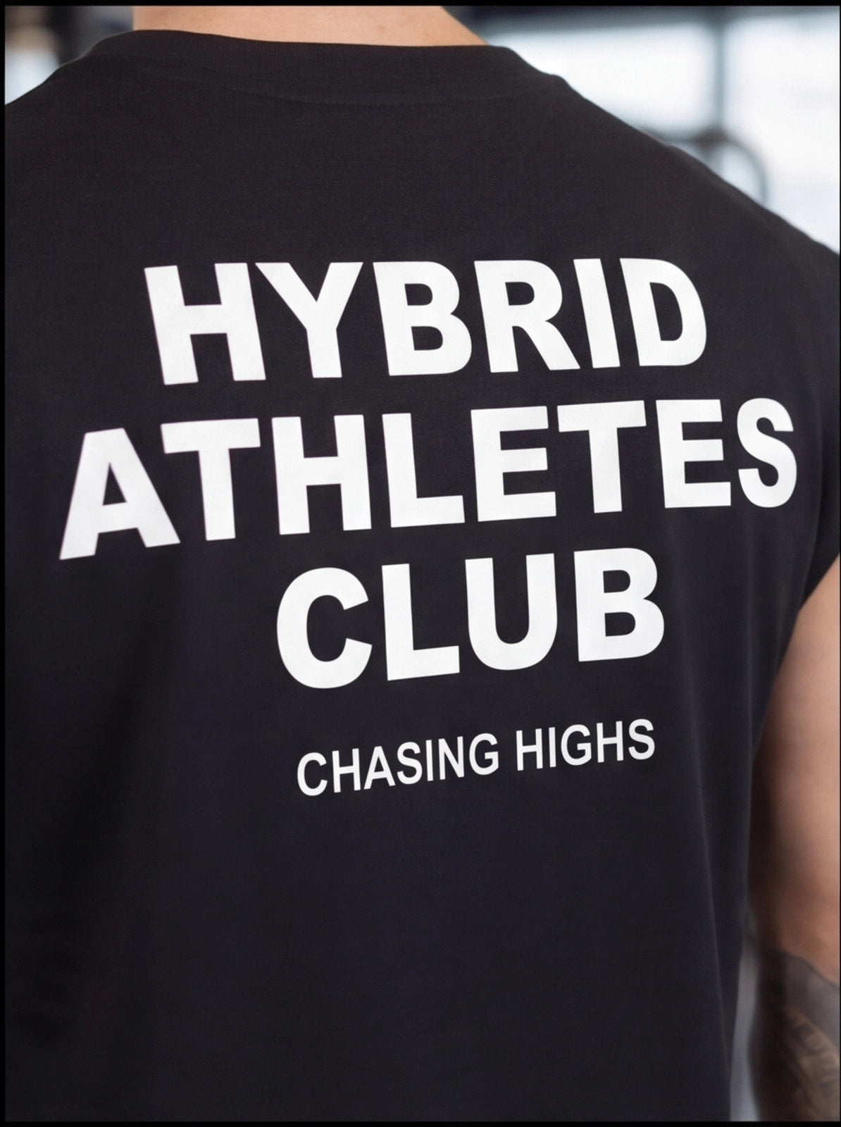 Black Hybrid Athletes Club t-shirt with 'Chasing Highs' text, functional fitness apparel for athletes.