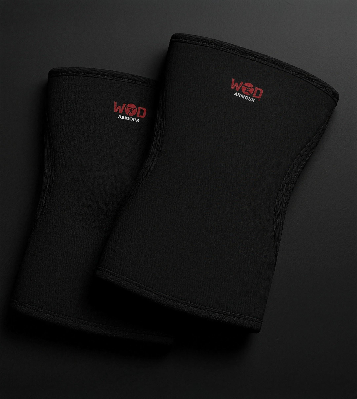 Two black WOD Armour knee sleeves for functional fitness and injury prevention.