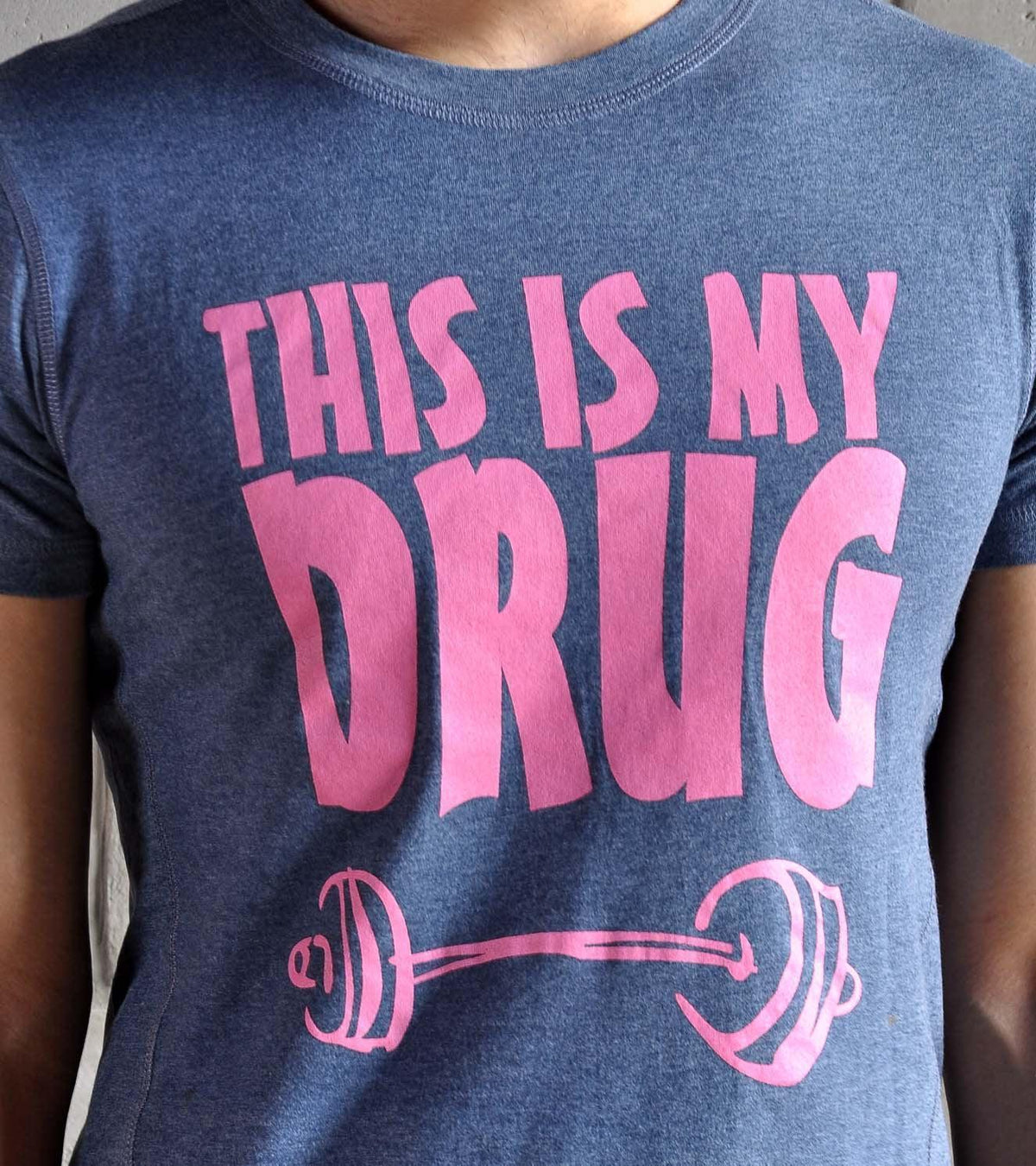 Blue t-shirt with pink text 'THIS IS MY DRUG' and a barbell graphic